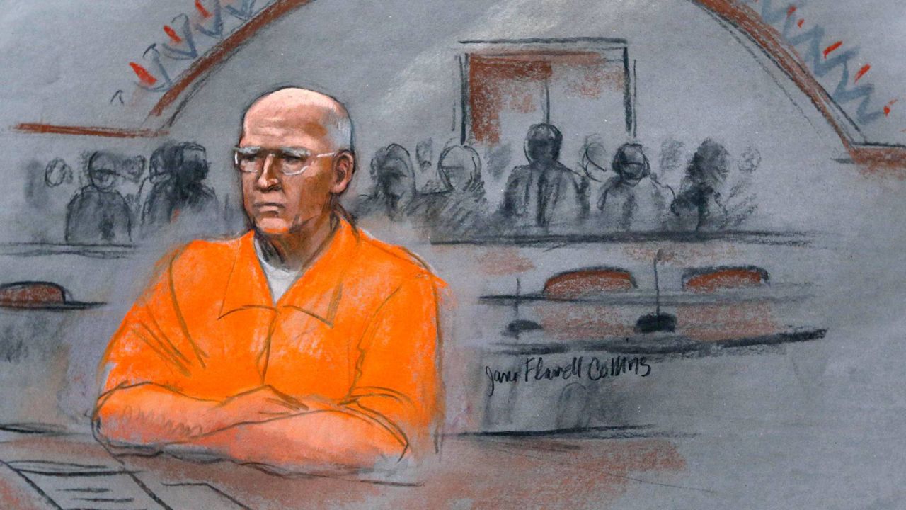 In this Nov. 13, 2013, file courtroom sketch, James "Whitey" Bulger sits at his sentencing hearing in federal court in Boston. (AP Photo/Jane Flavell Collins)