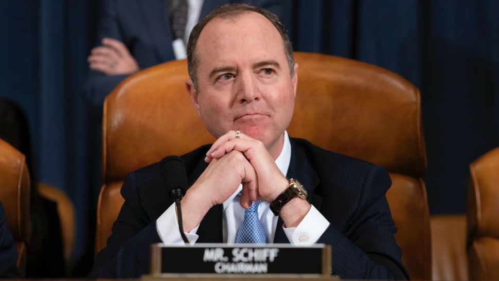 House Intelligence Committee Chairman Adam Schiff, D-Calif., listens as his panel hears testimony from top U.S. diplomat in Ukraine William Taylor and career Foreign Service officer George Kent, on Capitol Hill in Washington, Wednesday, Nov. 13, 2019, during the first public impeachment hearings of President Trump's efforts to tie U.S. aid for Ukraine to investigations of his political opponents. (AP Photo/J. Scott Applewhite)