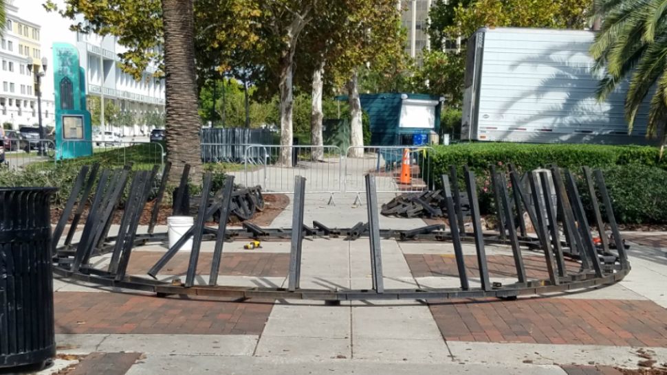 Workers are bolting the frame together on the city of Orlando's Christmas tree at Lake Eola Park. The official lighting ceremony is Friday, November 30. (William Claggett/Spectrum News 13)