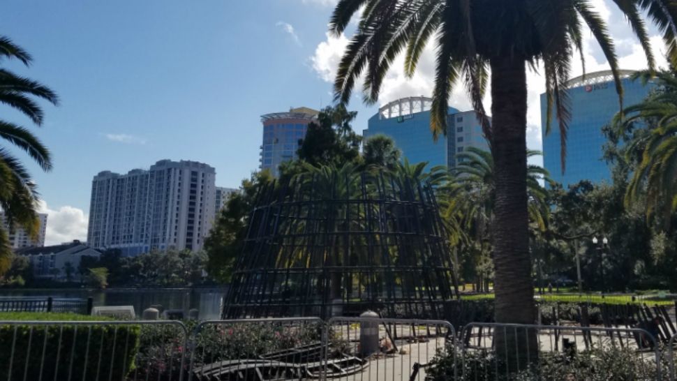 Workers are bolting the frame together on the city of Orlando's Christmas tree at Lake Eola Park. The official lighting ceremony is Friday, November 30. (William Claggett/Spectrum News 13)