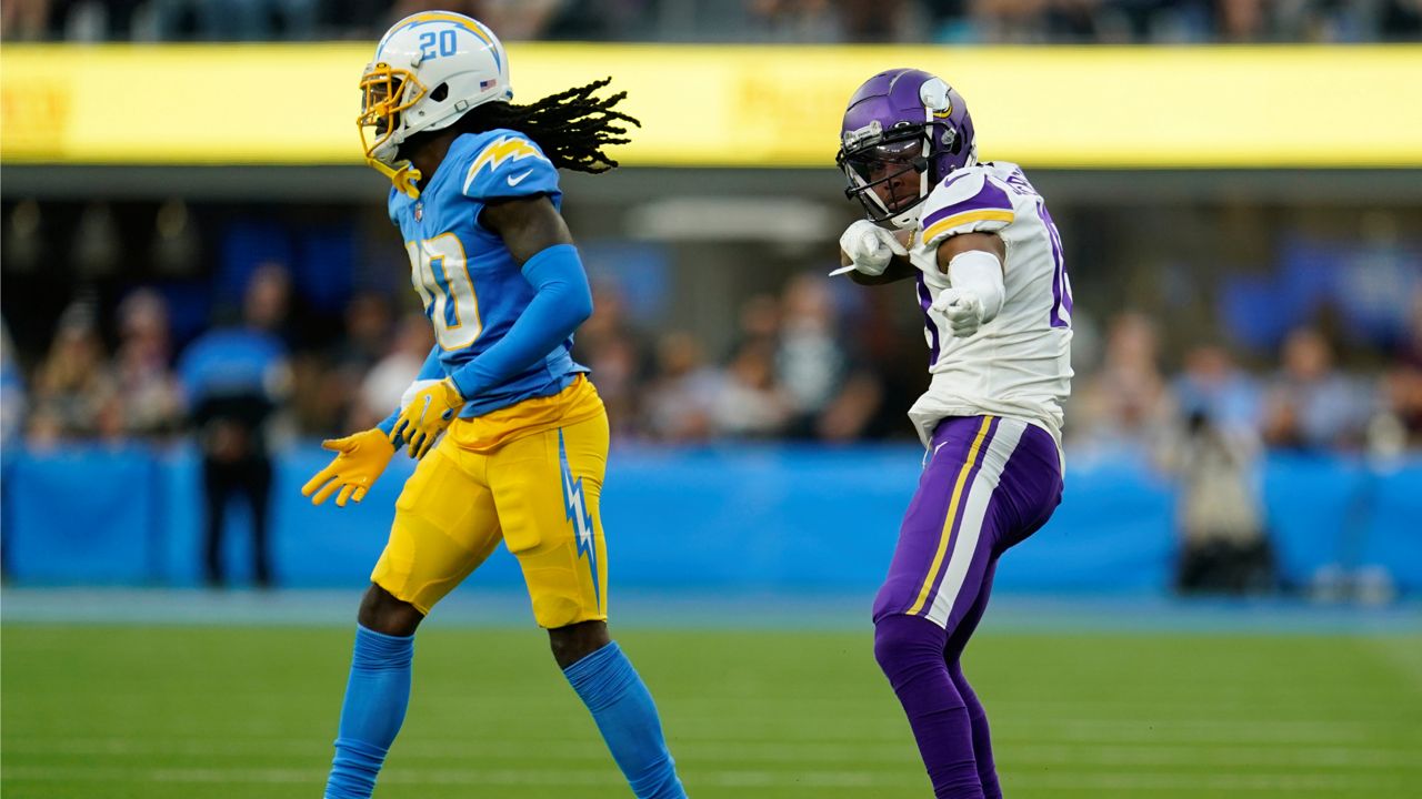Minnesota Vikings wide receiver Justin Jefferson, right, signals a first down during the second half of an NFL football game Sunday, Nov. 14, 2021, in Inglewood, Calif. (AP Photo/Marcio Jose Sanchez)