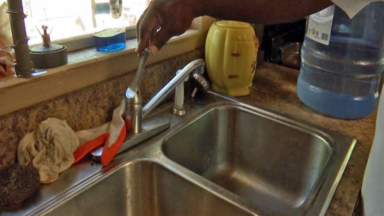  Retired plumber Michael Brown hasn't had running water for more than a year. (Krystel Knowles/Spectrum News 13)