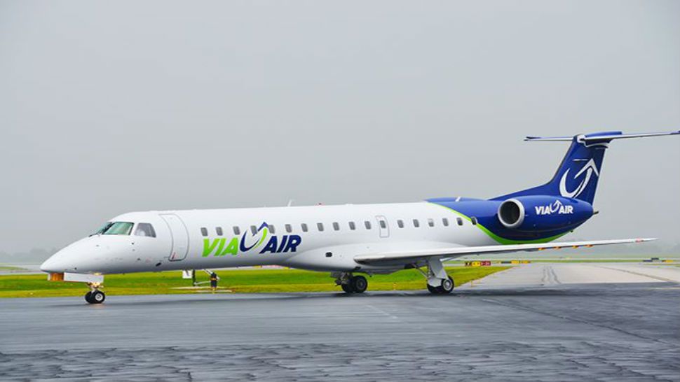 A ViaAir plan on a landing strip. 