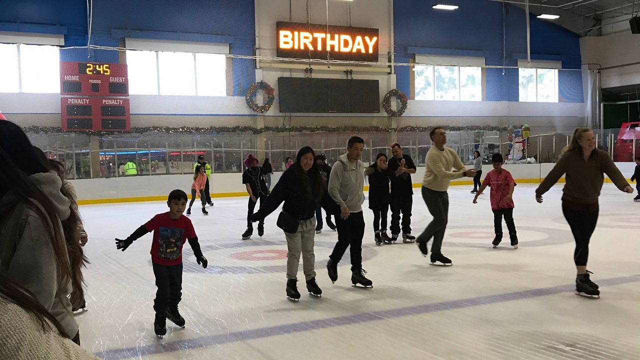 Drs. Jeremy Cho and Candice Yip, on a visit from their home in Las Vegas, hit the ice right before the rink closure. (Photo/Nuy Cho)