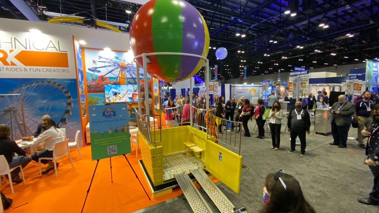Peppa Pig's Balloon Ride, one of the attractions coming to the Peppa Pig Theme Park, on display at the IAAPA Expo in Orlando. The ride has been designed to allow children who use wheelchairs to board without having to transfer from their wheelchairs. (Spectrum News/Ashley Carter)