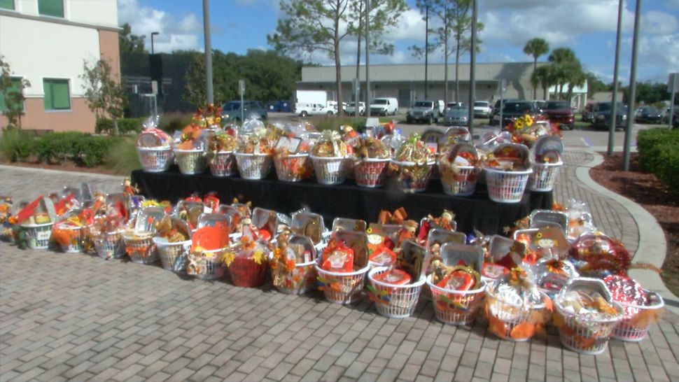 La Rosa Realty, along with the school district, non-profits, and churches like Illuminate Church, came together to create two thousand Thanksgiving baskets for families in need. (Stephanie Bechara/Spectrum News 13)