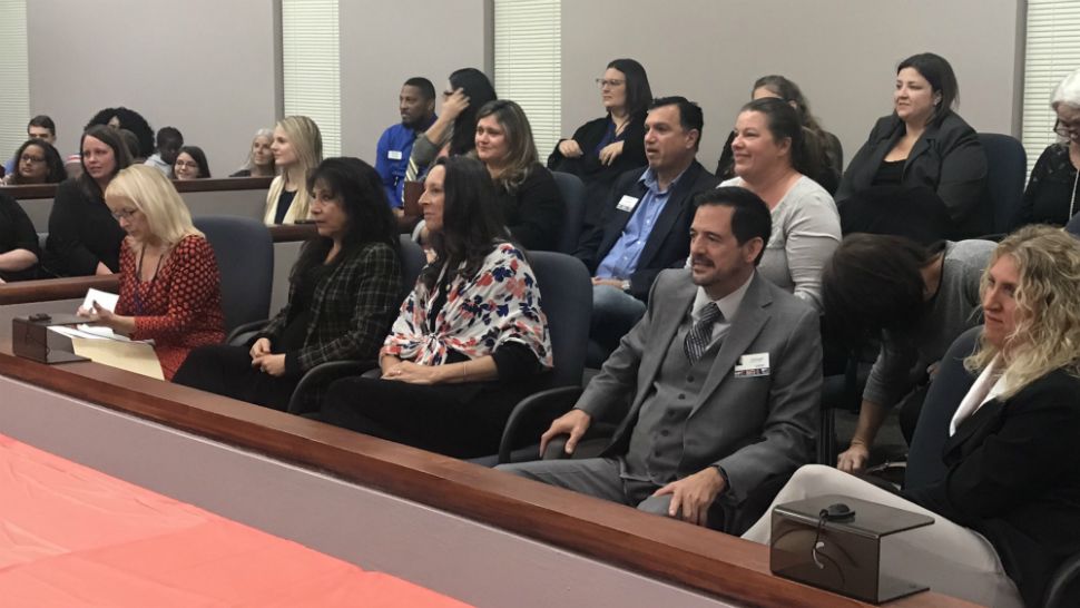 Danielle Harper and the Harper family adopted 3 children at the courthouse in Viera on Friday, November 16, 2018. (Greg Pallone/Spectrum News 13)