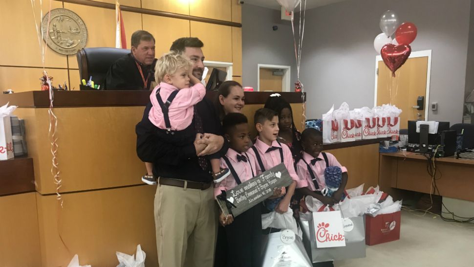 Danielle Harper and the Harper family adopted 3 children at the courthouse in Viera on Friday, November 16, 2018. (Greg Pallone/Spectrum News 13)