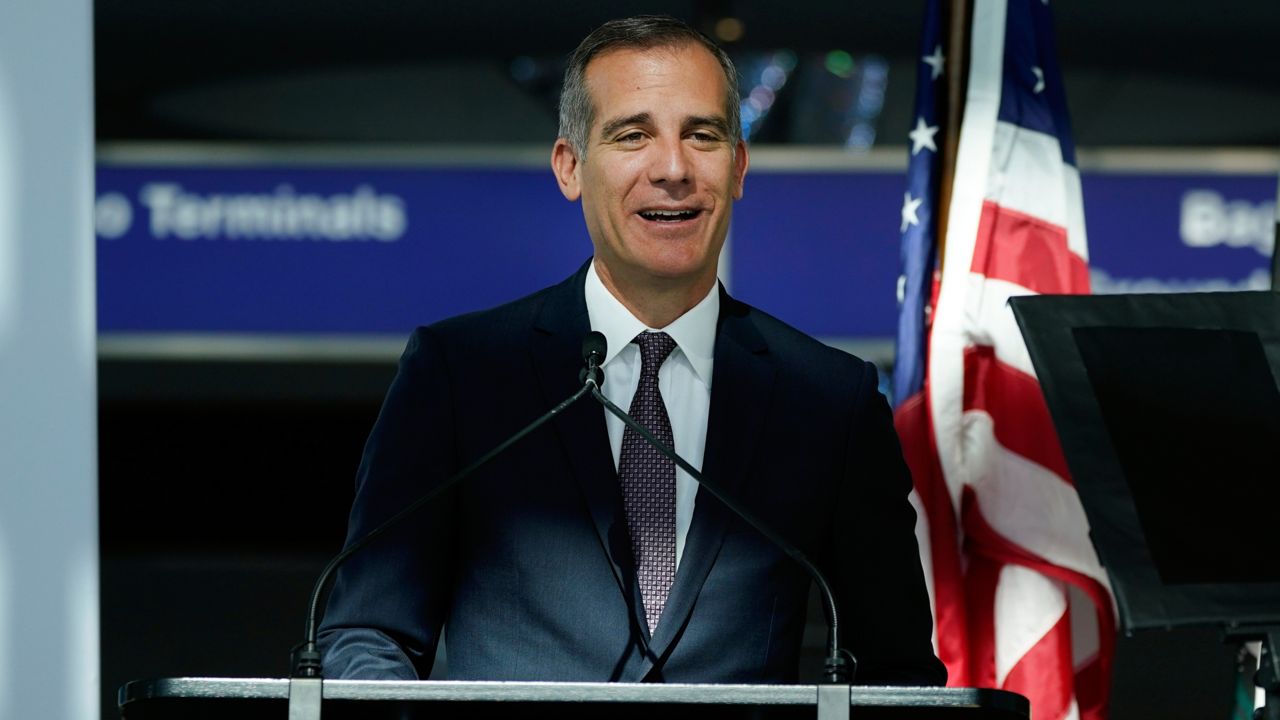 Los Angeles Mayor Eric Garcetti speaks at a news conference at Los Angeles International Airport on May 24, 2021, in Los Angeles. (AP Photo/Ashley Landis, File)
