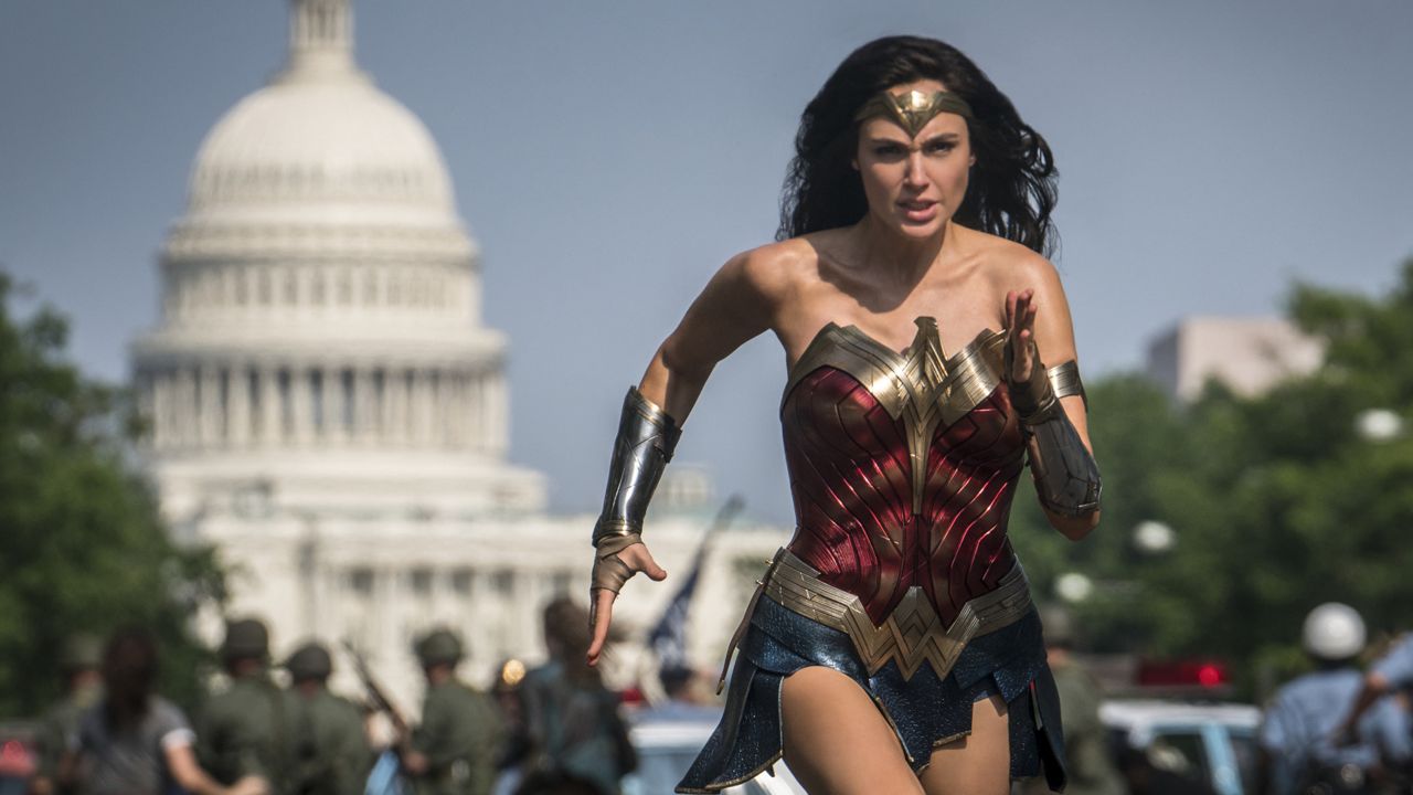 The last big blockbuster holdout of 2020, "Wonder Woman 1984," is still opening in U.S. theaters on Christmas Day but it will also be made available to HBO Max subscribers free of charge for its first month, Warner Bros. said Wednesday, Nov. 18, 2020. (Clay Enos/Warner Bros Pictures via AP)
