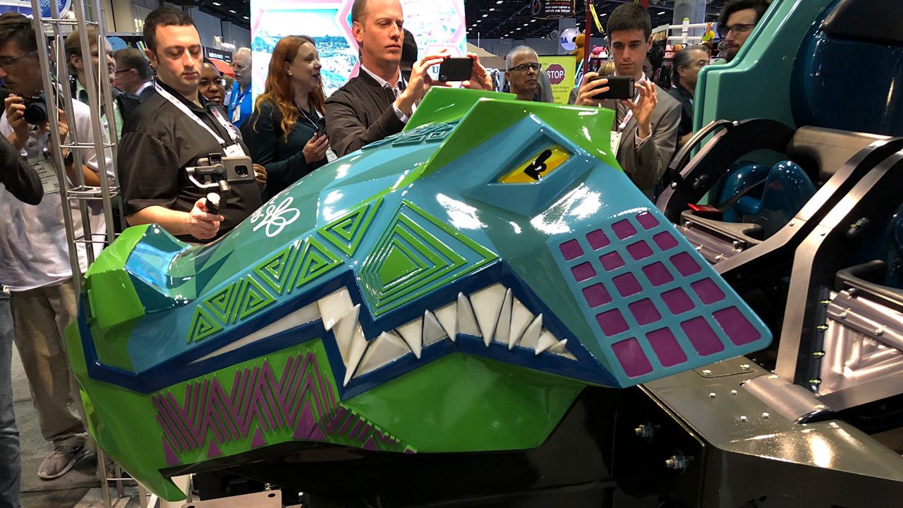 Busch Gardens unveils the ride vehicle for the Iron Gwazi roller coaster at IAAPA in Orlando. (Ashley Carter, Spectrum News)