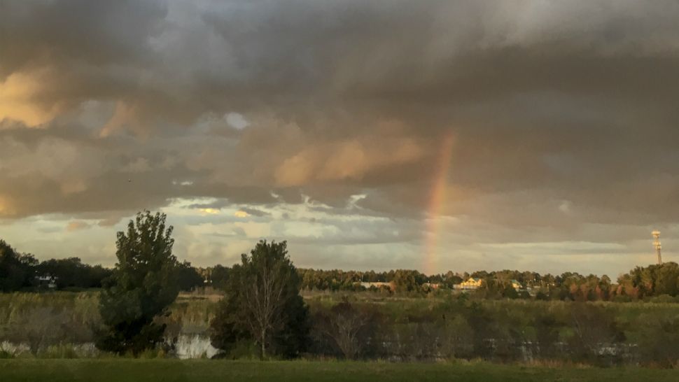 Sent to us with the Spectrum News 13 app: Sun, clouds, and color near Good Homes Road in west Orange County on Monday. (Marc Quiles/viewer)