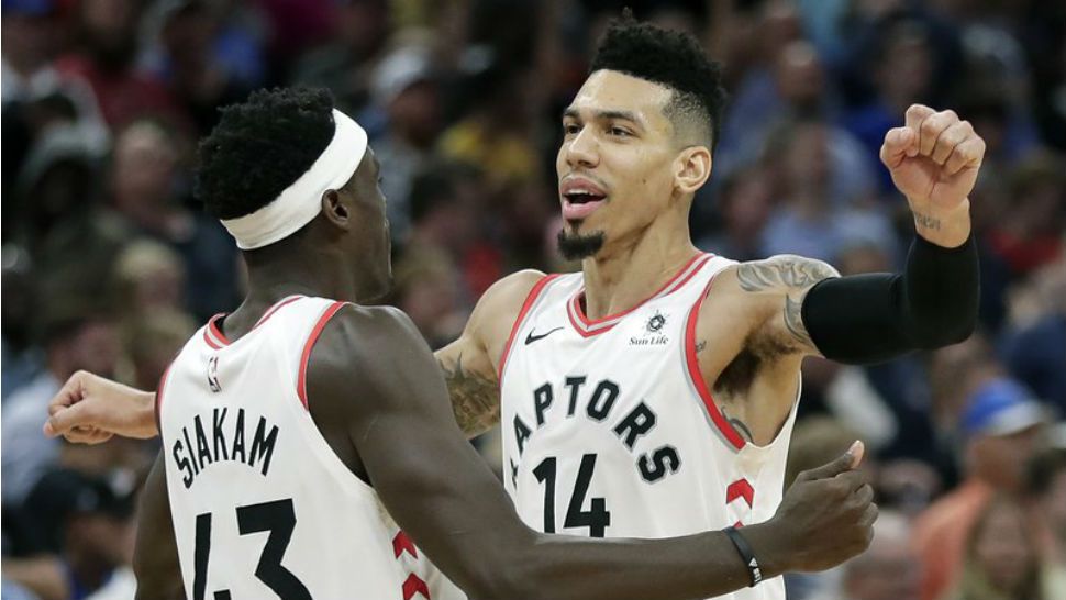 Toronto Raptors' Danny Green (14) celebrates his game winning shot against the Orlando Magic with teammate Pascal Siakam (43) in the final seconds of an NBA basketball game, Tuesday, Nov. 20, 2018, in Orlando, Fla. (AP Photo/John Raoux)