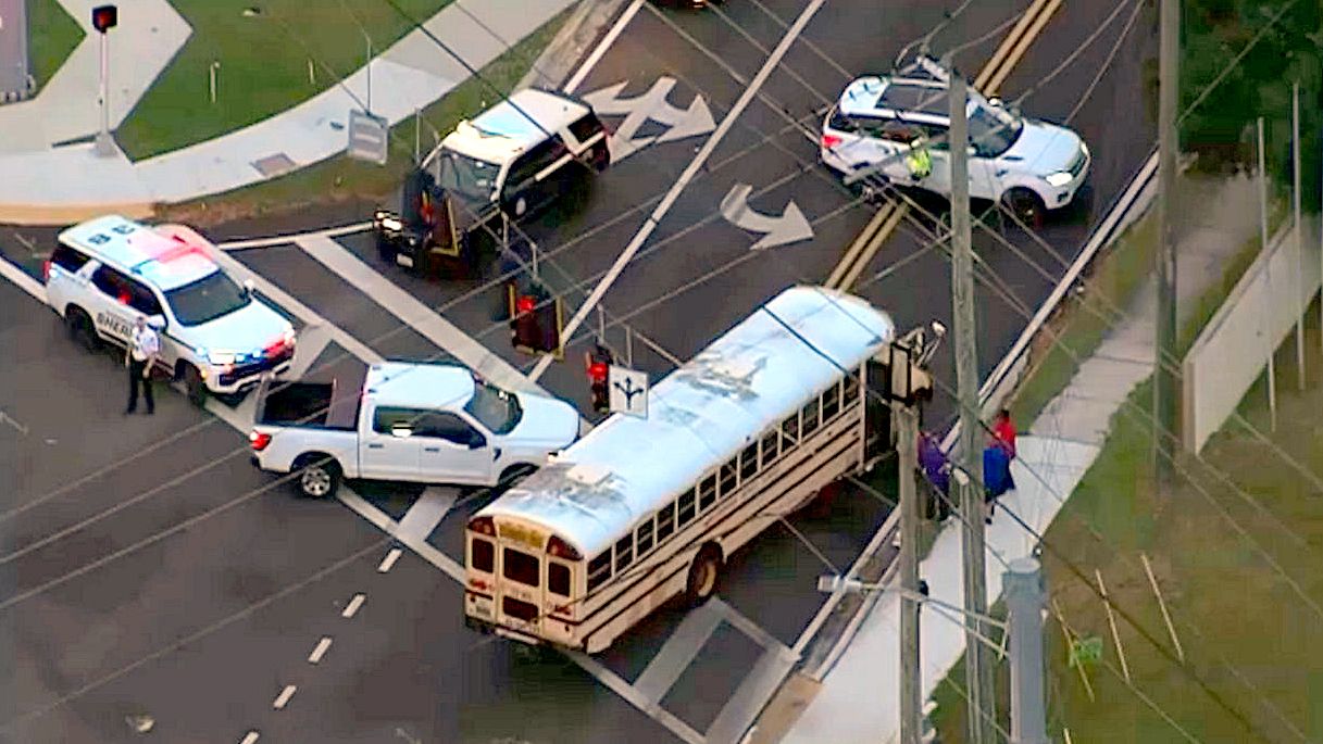 Sky 9 image of Wednesday evening shows the scene of a fatal crash between a school bus and a motorcycle in Riverview. (Spectrum News)