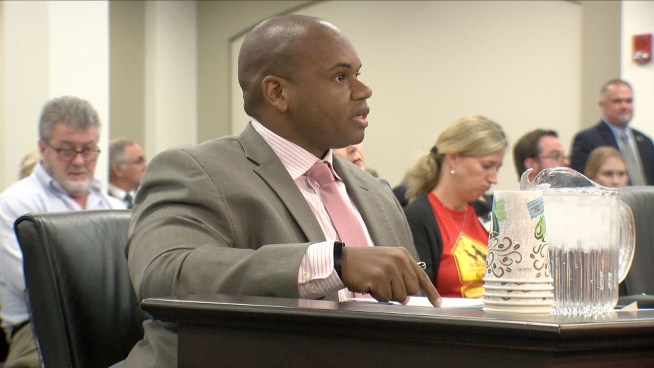 Kentucky Education Commissioner Wayne Lewis testifies in front of the Interim Joint Committee on Education