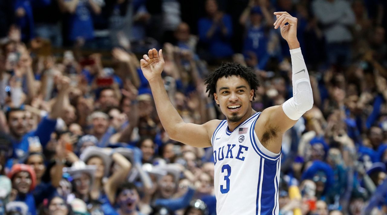 In this March 7, 2020, file photo, Duke guard Tre Jones (3) reacts during the second half of the team's NCAA college basketball game against North Carolina in Durham, N.C. (AP Photo/Gerry Broome, File)