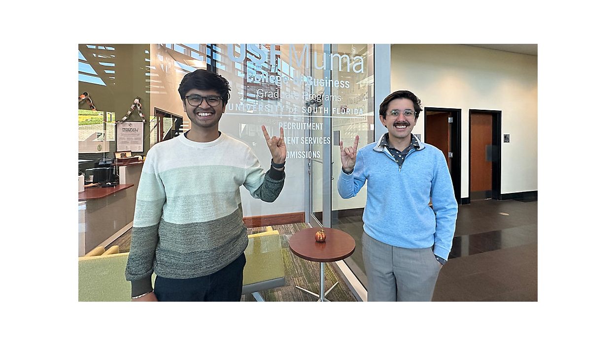 Sarthak Pattnaik, left, and Nicholas Pacini pose inside of USF Muma College. (Spectrum Bay News 9/Lizbeth Gutierrez)