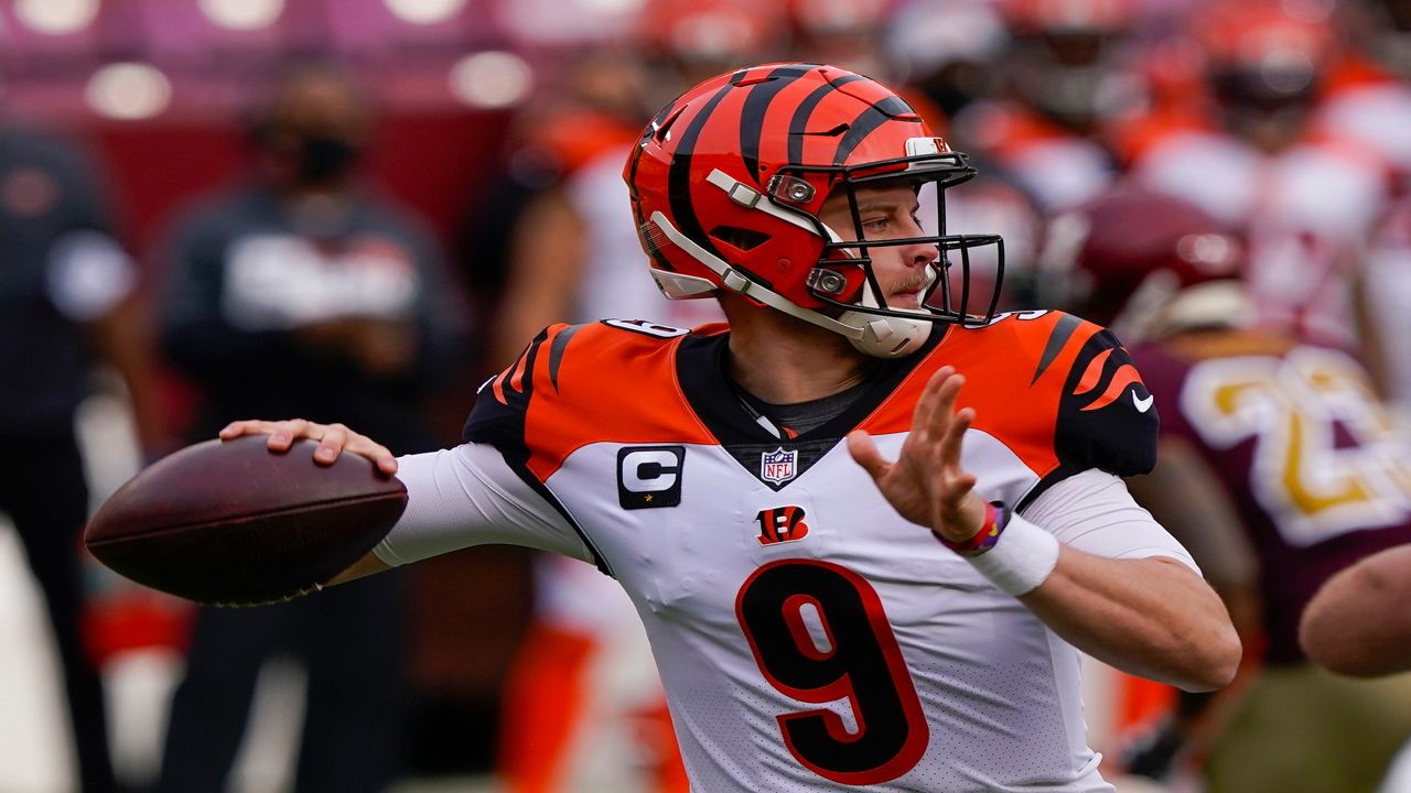 Joe Burrow of the Bengals throws a football