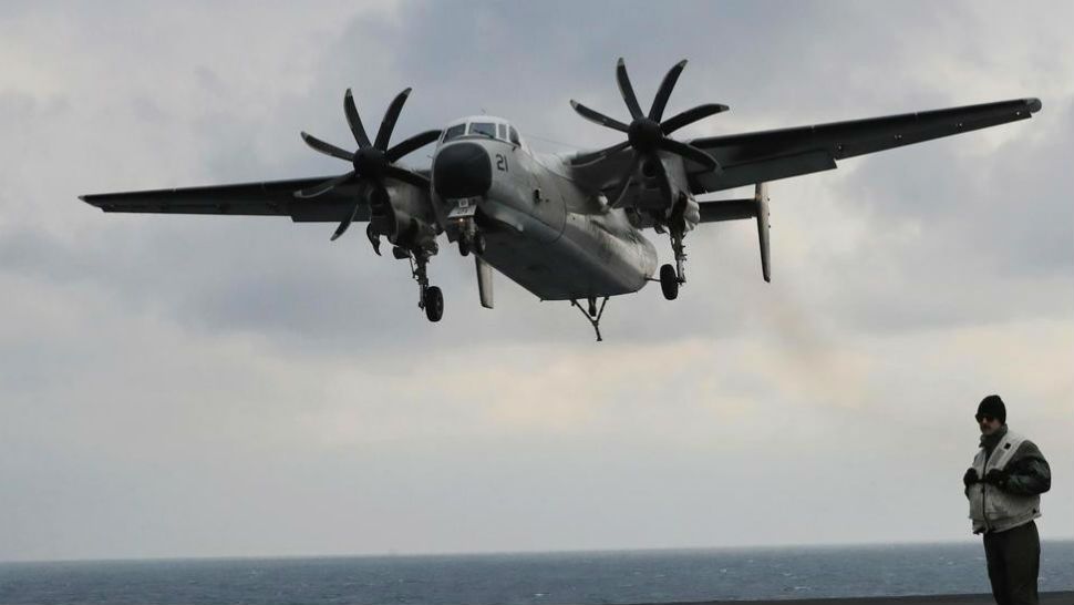 In this March 14, 2017, file photo, a U.S. Navy C-2 Greyhound approaches the deck of the Nimitz-class aircraft carrier USS Carl Vinson during the annual joint military exercise called Foal Eagle between South Korea and the United States at an unidentified location in the international waters, east of the Korean Peninsula. (AP Photo/Lee Jin-man, File)