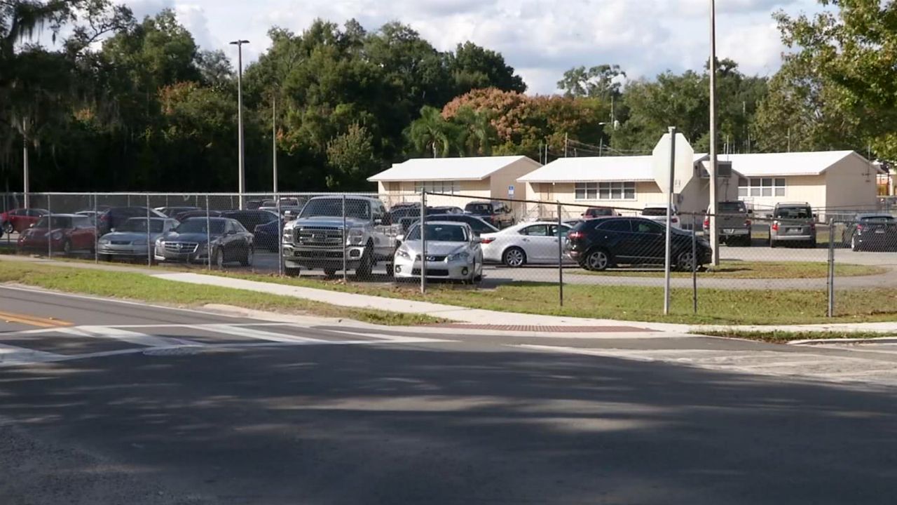 Just feet from a school, DeLand Police say a woman was walking when a man forced her into his vehicle, drove her to a secluded area and raped her. (Spectrum News 13)