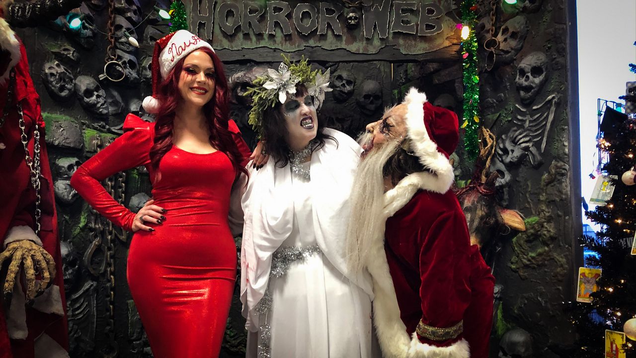 People in Christmas horror attire at the Travis County Exposition Center on Nov. 23, 2019 (Spectrum News)