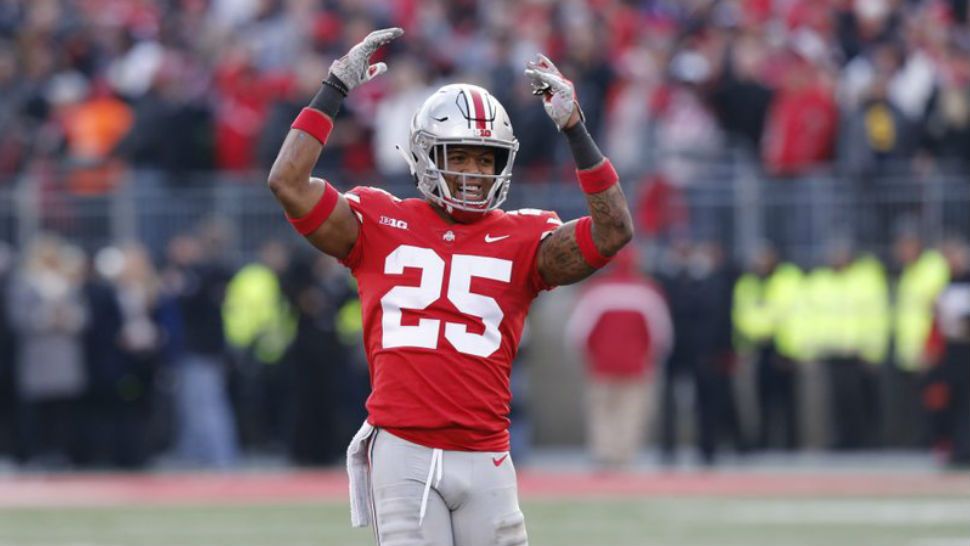 Ohio State defensive back Brendon White celebrates after making a tackle against Michigan during the second half of an NCAA college football game Saturday, Nov. 24, 2018, in Columbus, Ohio. Ohio State beat Michigan 62-39. (AP Photo/Jay LaPrete)