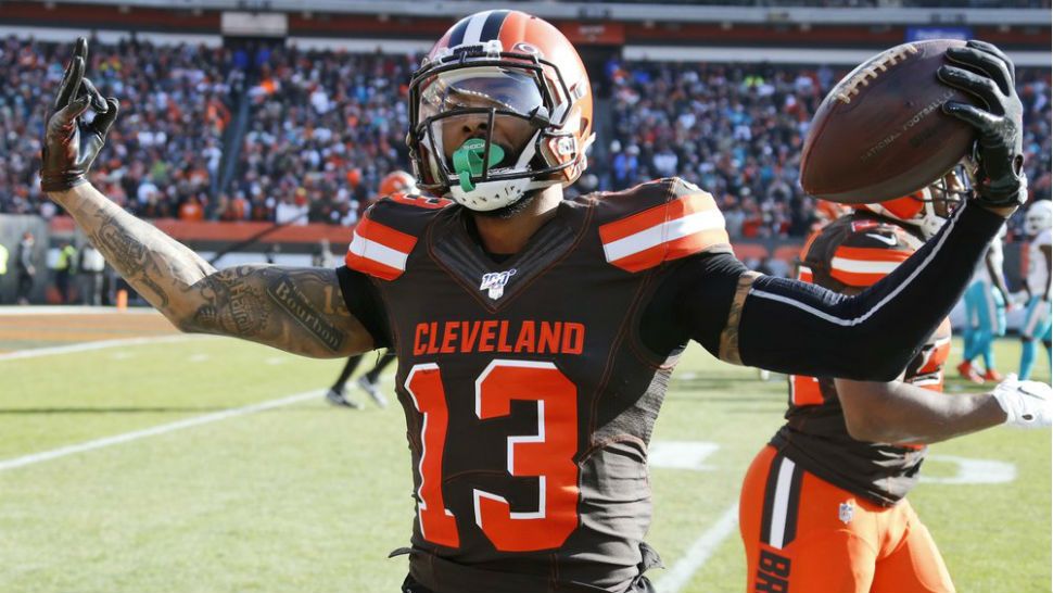 Cleveland Browns wide receiver Odell Beckham Jr. celebrates after a 35-yard touchdown during the first half of an NFL football game against the Miami Dolphins, Sunday, Nov. 24, 2019, in Cleveland. (AP Photo/Ron Schwane)