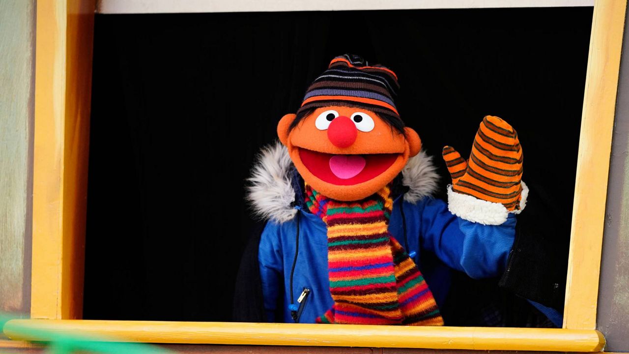 Ernie from Sesame Street rides a float in the Macy's Thanksgiving Day Parade on Nov. 25, 2021, in New York. (Photo by Charles Sykes/Invision/AP)