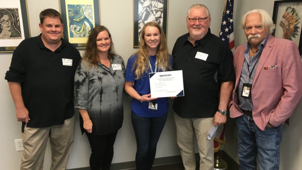 Sarah Lowery recently was presented with a certificate from Bradenton Mayor Wayne Poston. She'll receive a $1,000 scholarship for the school of her choice at the end of the this school year. (Spectrum News)