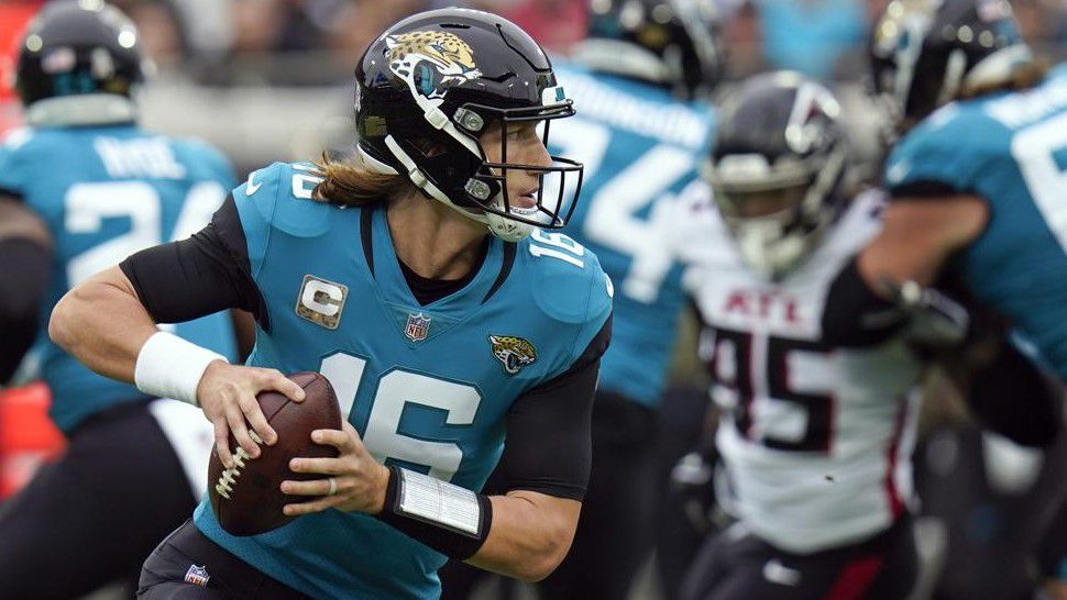 Jacksonville Jaguars quarterback Trevor Lawrence (16) looks for a receiver against the Atlanta Falcons during the first half of an NFL football game, Sunday, Nov. 28, 2021, in Jacksonville, Fla. (AP Photo/Chris O'Meara)