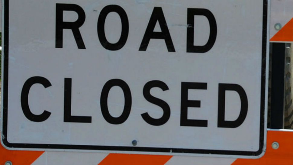 FILE- Road closed sign.