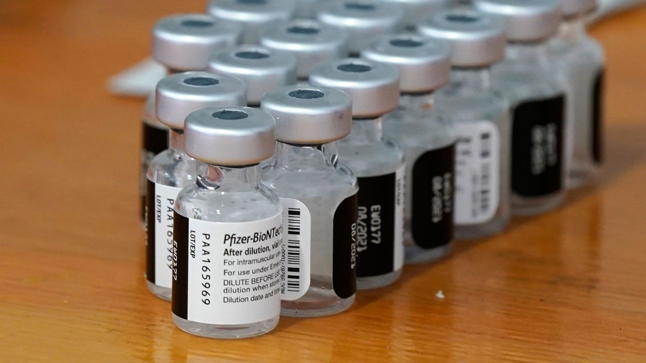 A Nov. 30, 2021, file photo of Pfizer COVID-19 vaccines at a Dallas County Health and Human Services drive up vaccine site in Mesquite, Texas