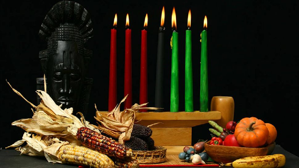A Kinara along with the other principles of Kwanzaa (Photo credit: http://www.austintexas.gov/)