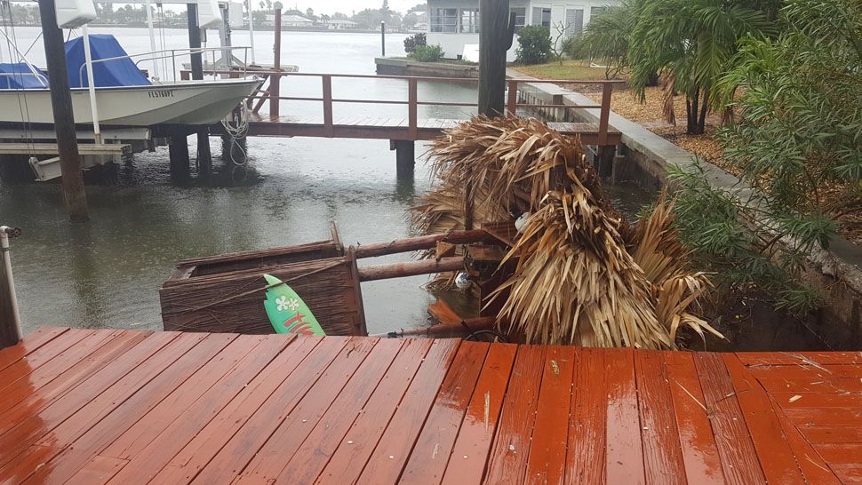 Large Tiki Hut blown from dock into canal off Intercoastal waterway in Madeira Beach (Courtesy of Bill, viewer)