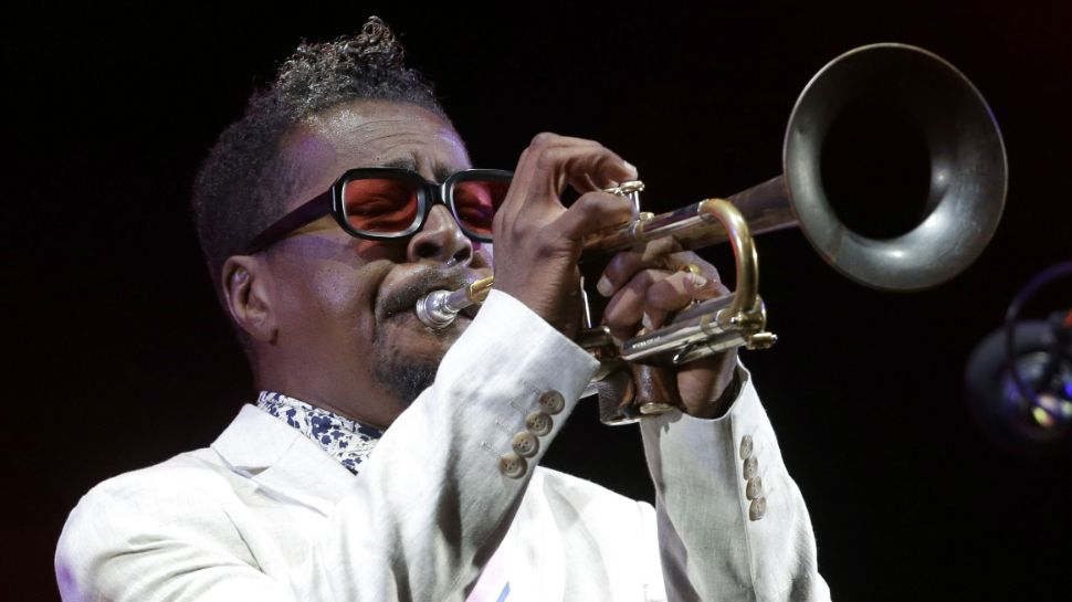 In this July 26, 2018 photo, American jazz trumpeter Roy Hargrove performs at the Five Continents Jazz festival, in Marseille, southern France. The Grammy-winning jazz trumpeter has died at age 49. Manager Larry Clothier says in a statement that Hargrove died in New York on Friday, Nov. 2, from cardiac arrest stemming from a longtime fight with kidney disease. (AP Photo/Claude Paris)