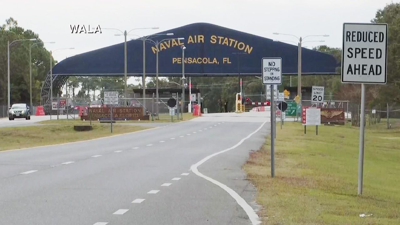 An entry gate at Naval Air Station Pensacola in north Florida. (Screen capture from WALA via CNN)