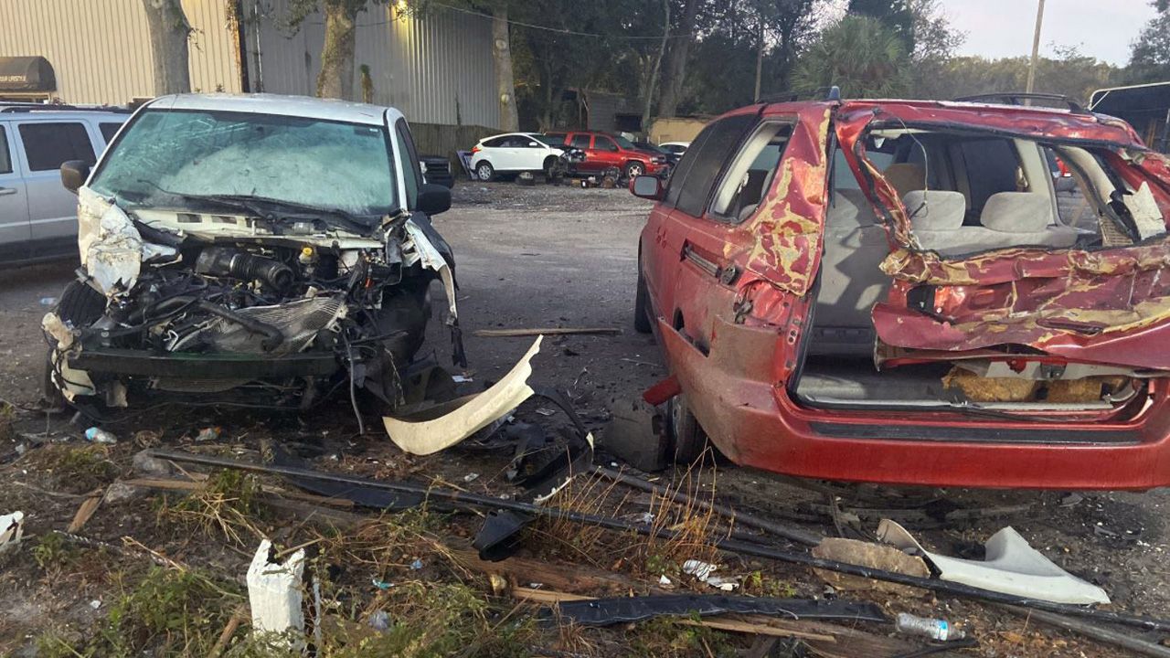 The driver struck cars parked at Tampa Imports LLC, a used car dealership on North Florida Avenue, near East 143rd Avenue, on Friday morning. (Jorja Roman/Spectrum Bay News 9)