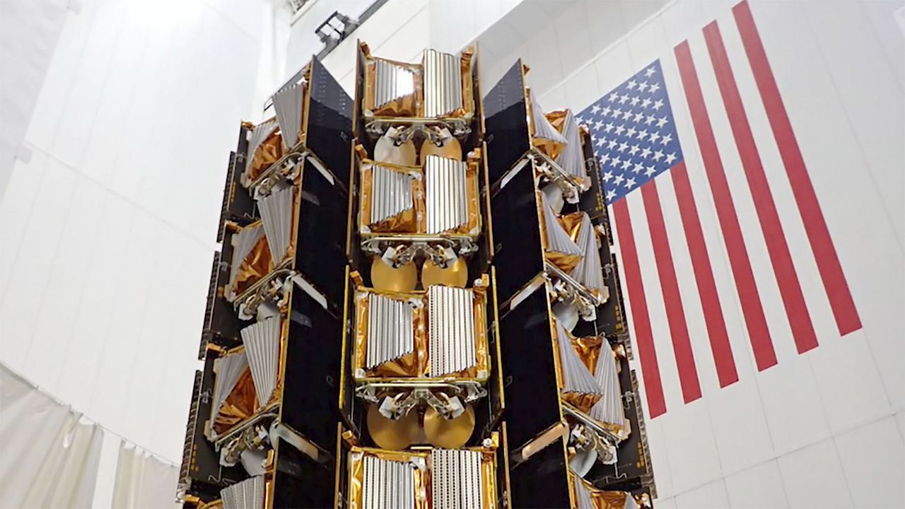 Satellites built at Merritt Island-based Airbus OneWeb Satellites are fully integrated onto the second stage of a SpaceX Falcon 9 rocket before being encapsulated into payload fairings for launch. (OneWeb)