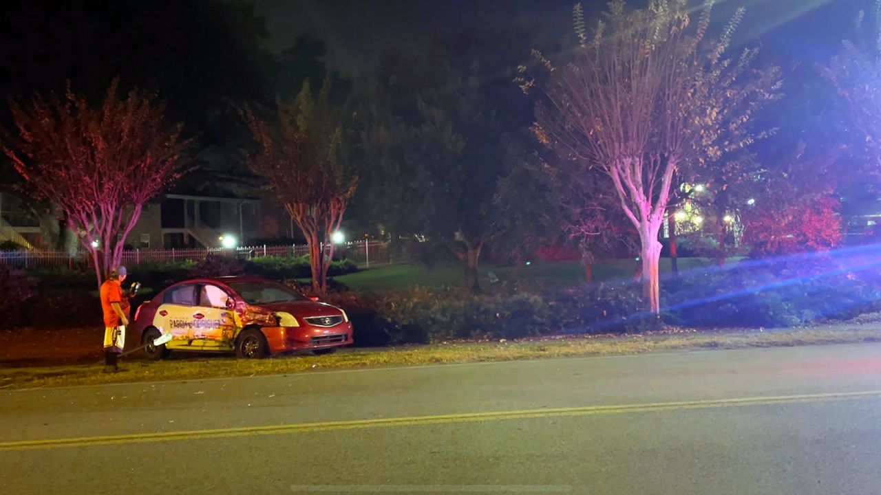 The Orlando Police Department stated that two vehicles (a car and a pickup truck) crashed at Lake Underhill Road in Orlando and one person was taken to the hospital with non-life-threatening injuries. (Spectrum News 13/Justin Soto)