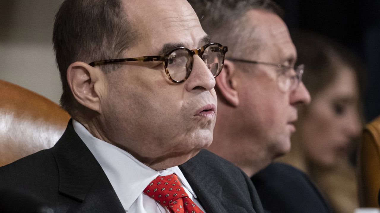 House Judiciary Committee Chairman Jerrold Nadler, D-N.Y., left, exhales after a day of work with Rep. Doug Collins, R-Ga., the ranking member, right, on the markup of articles of impeachment against President Donald Trump, Thursday, Dec. 12, 2019, on Capitol Hill in Washington. (AP Photo/J. Scott Applewhite)