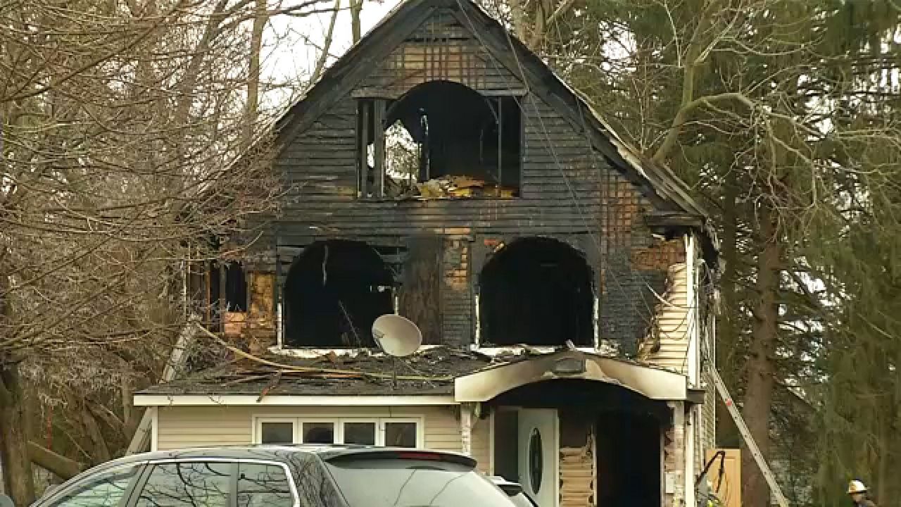 2 children killed in Utica house fire