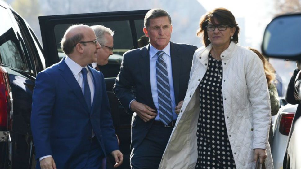 Former Trump national security adviser Michael Flynn arrives at federal court in Washington, Friday, Dec. 1, 2017. Court documents show Flynn, an early and vocal supporter on the campaign trail of President Donald Trump whose business dealings and foreign interactions made him a central focus of Mueller’s investigation, will admit to lying about his conversations with Russia’s ambassador to the United States during the transition period before Trump’s inauguration. (AP Photo/Susan Walsh)