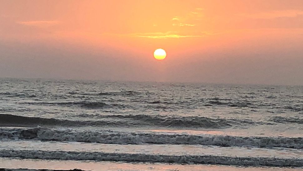 Submitted via the Spectrum News 13 app: Sunset in Cocoa Beach, Sunday, Dec. 2, 2018. (Courtesy of Carl Cioci)