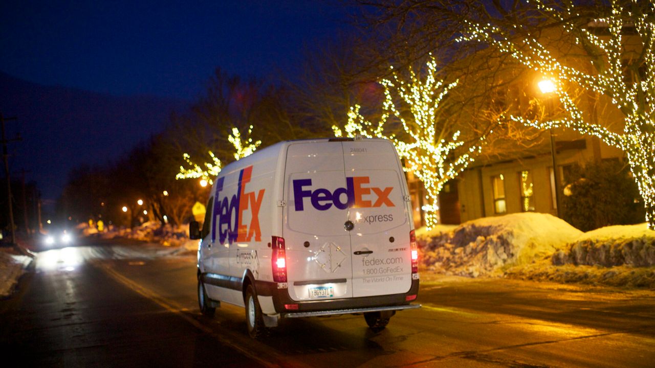 Delivery drivers and warehouse workers put in long hours between Thanksgiving and Christmas. (FedEx)