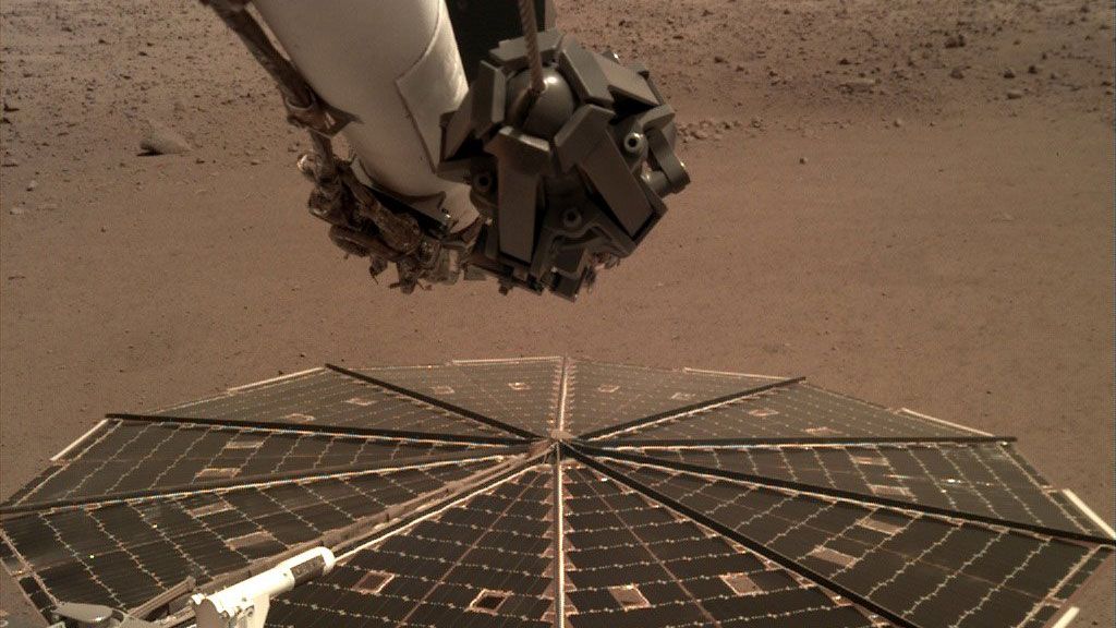 NASa InSight took this shot of its solar panel on Mars. (NASA)