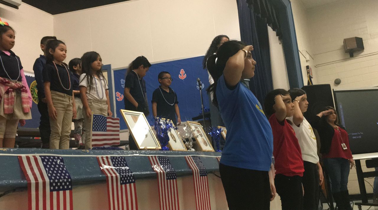 Children at Dorie Miller Elementary for Pearl Harbor Day assembly December 7, 2018 (Spectrum News)