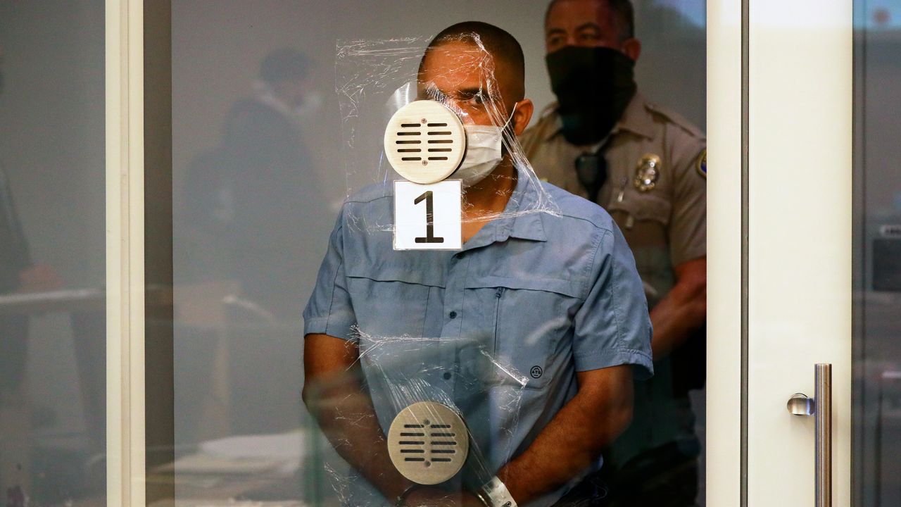 Eddie F. Gonzalez, 51, now ex-school safety officer appeared for arraignment in a Long Beach courtroom charged in the death of 18-year-old Manuela "Mona" Rodriguez in Long Beach, Calif. on Friday, Oct. 29, 2021. (Al Seib/Los Angeles Times via AP, Pool, File)