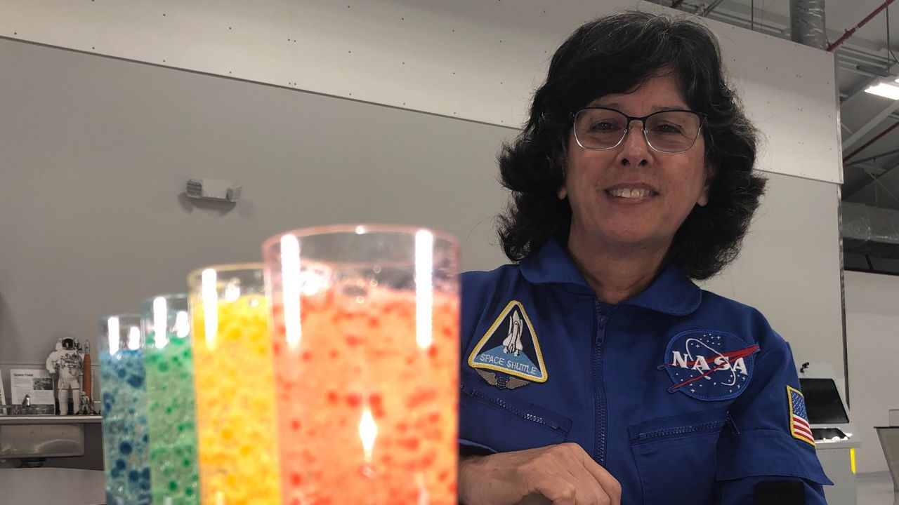 Dee Maynard, Kennedy Space Center Visitor Complex's education program manager, comes up with the experiments for the virtual camp. (Allison Walker Torres/Spectrum News 13)