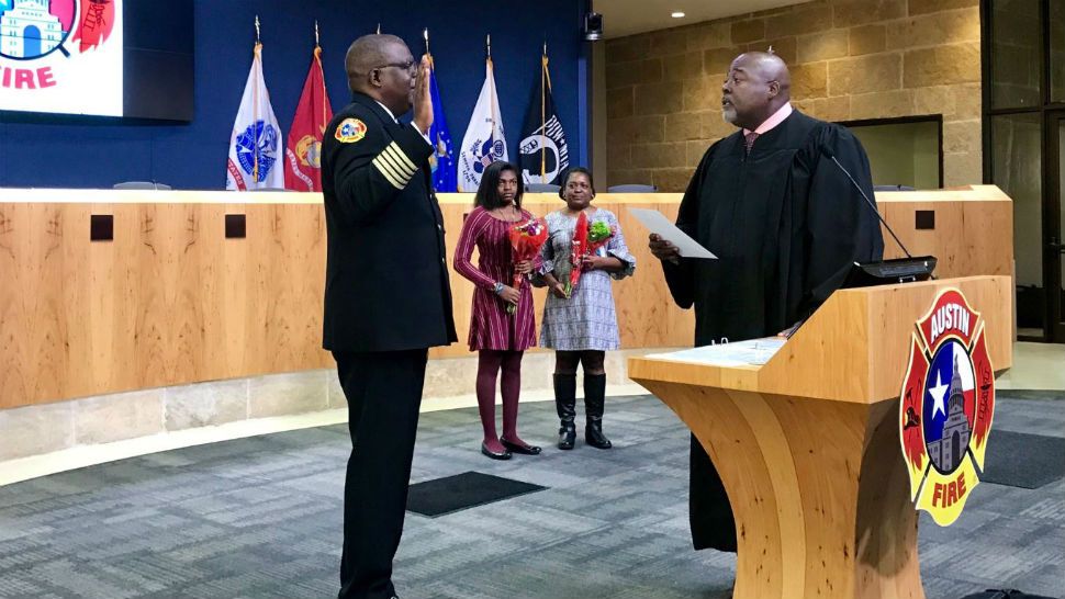 Joel G. Baker was sworn in by the Honorable Cliff Brown, of the 147th Criminal District Court. Chief Baker’s daughter, Jaelynn, and wife, Jennifer, stood by. (Courtesy: Twitter @Austinfiredept)