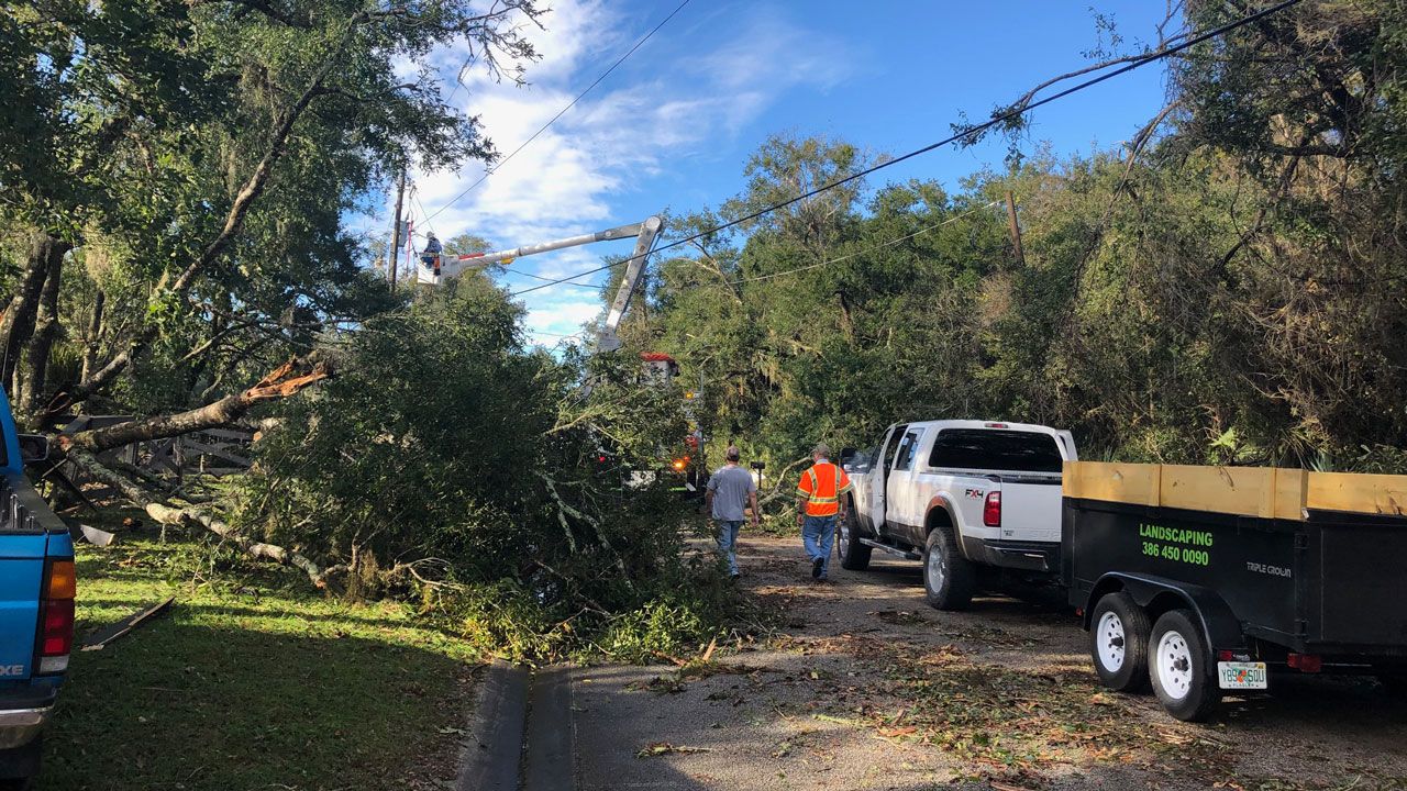 Downed power lines in a Flagler Beach neighborhood after early morning storms Saturday. (Vincent Earley, Spectrum News)